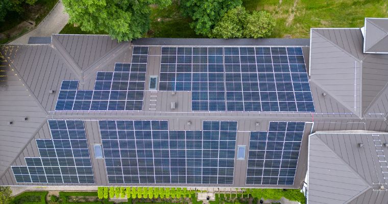 A house with solar panels that produces renewable energy, in Whitefish