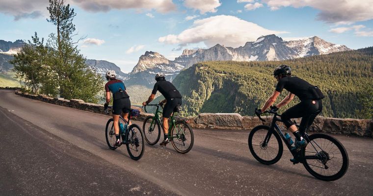 Tourists enjoy biking tour with stunning view of the mountains in Whitefish, Montana