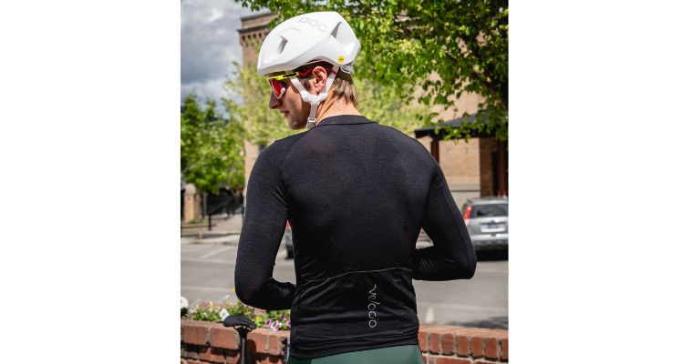 The cyclist wears bike accessories by Great Northern Cycle & Ski