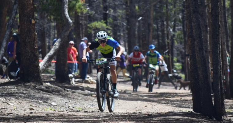 A group of mountain bikers races down a trail during the Glacier Enduro Mountain Bike Race in Whitefish Events.