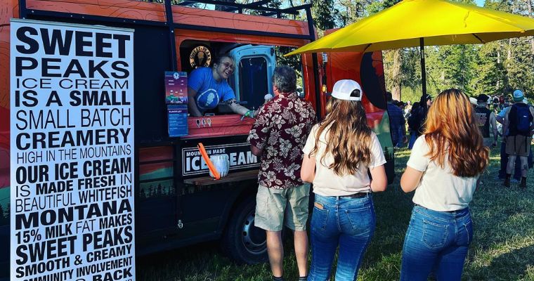 The Sweet Peaks Ice Cream truck in the forest with their delicious ice cream choices