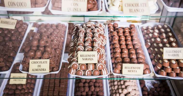 Assorted chocolates displayed in the Copperleaf Chocolat Company shop window in Whitefish, Montana.