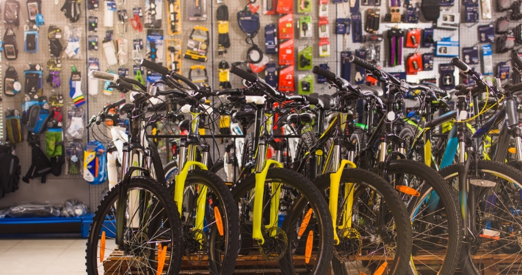 Interior view of Great Northern Cycle & Ski, showcasing multiple bikes and equipments for sale in Whitefish, Montana.