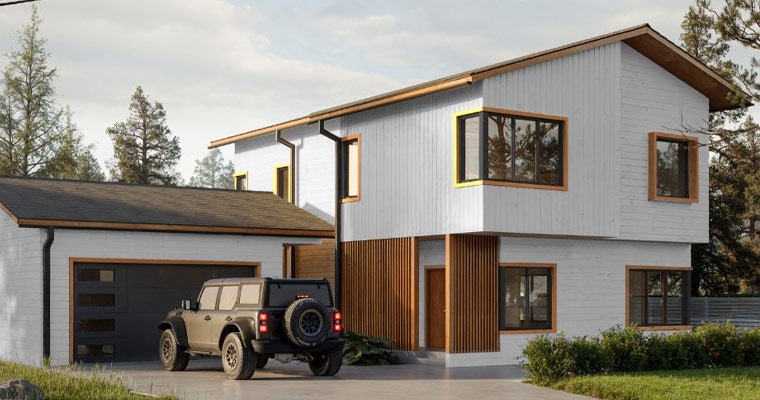 Modern eco-luxury house with a car parked in front, highlighting sustainable development in Whitefish, Montana.