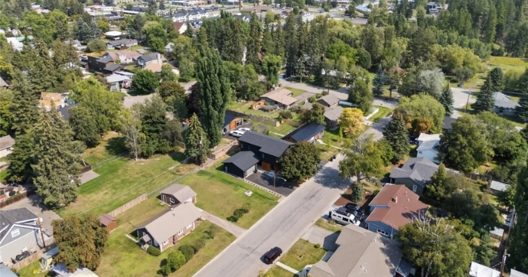 Aerial view of a residential neighborhood, showcasing homes and streets in a suburban setting.